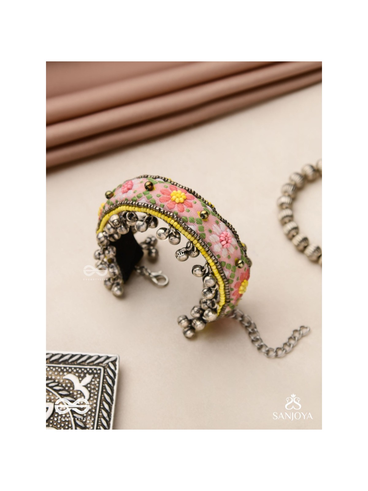 SUMANALEKHA-FLORAL PATTERN- SEMI-OXIDIZED BRACELET FEATURES GHUNGROO, BEADS, AND EMBROIDERED FLOWERS