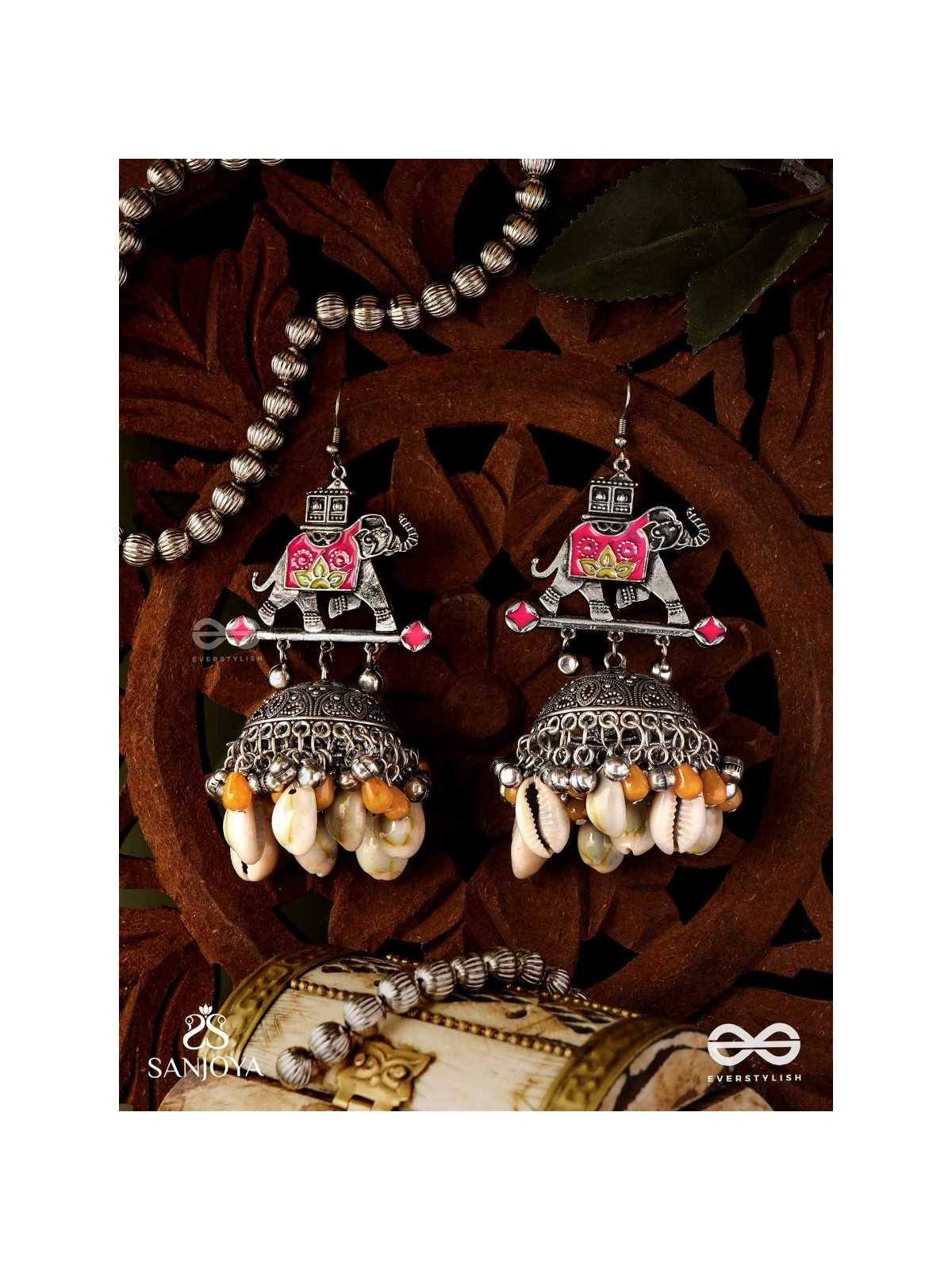 GAJASANKHA KARṆIKA- ELEPHANT-SHELL EARRINGS- OXIDIZED EARRINGS FEATURING AN ELEGANT MOTIF, DELICATE GHUNGHROO'S, AND COWRIE SHELLS
