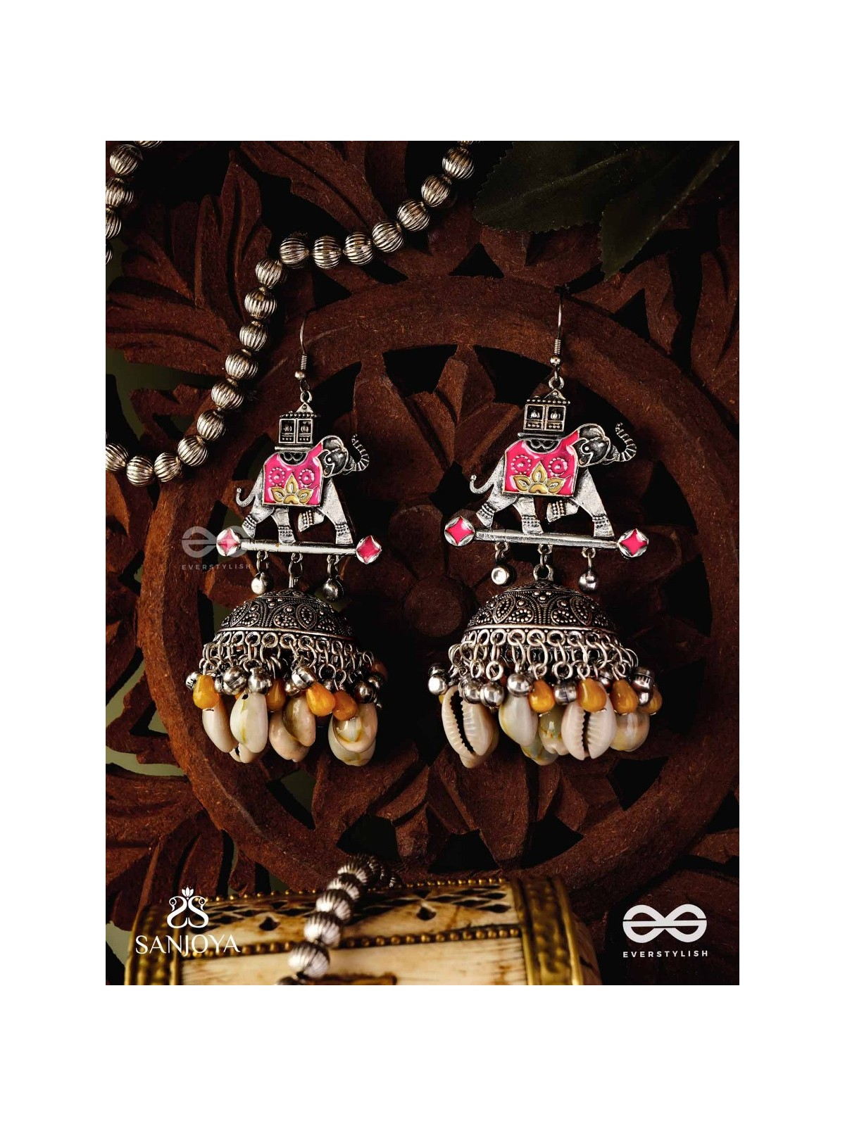 GAJASANKHA KARṆIKA- ELEPHANT-SHELL EARRINGS- OXIDIZED EARRINGS FEATURING AN ELEGANT MOTIF, DELICATE GHUNGHROO'S, AND COWRIE SHELLS
