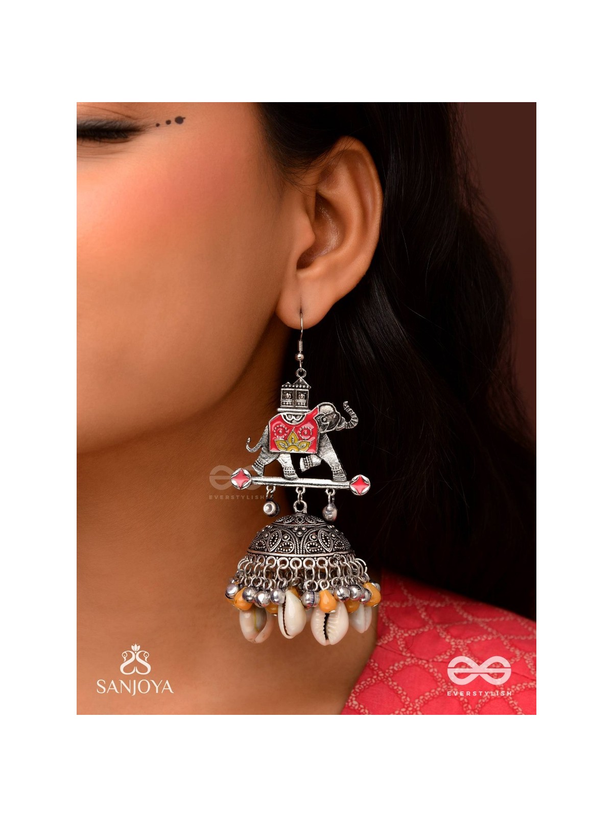 GAJASANKHA KARṆIKA- ELEPHANT-SHELL EARRINGS- OXIDIZED EARRINGS FEATURING AN ELEGANT MOTIF, DELICATE GHUNGHROO'S, AND COWRIE SHELLS