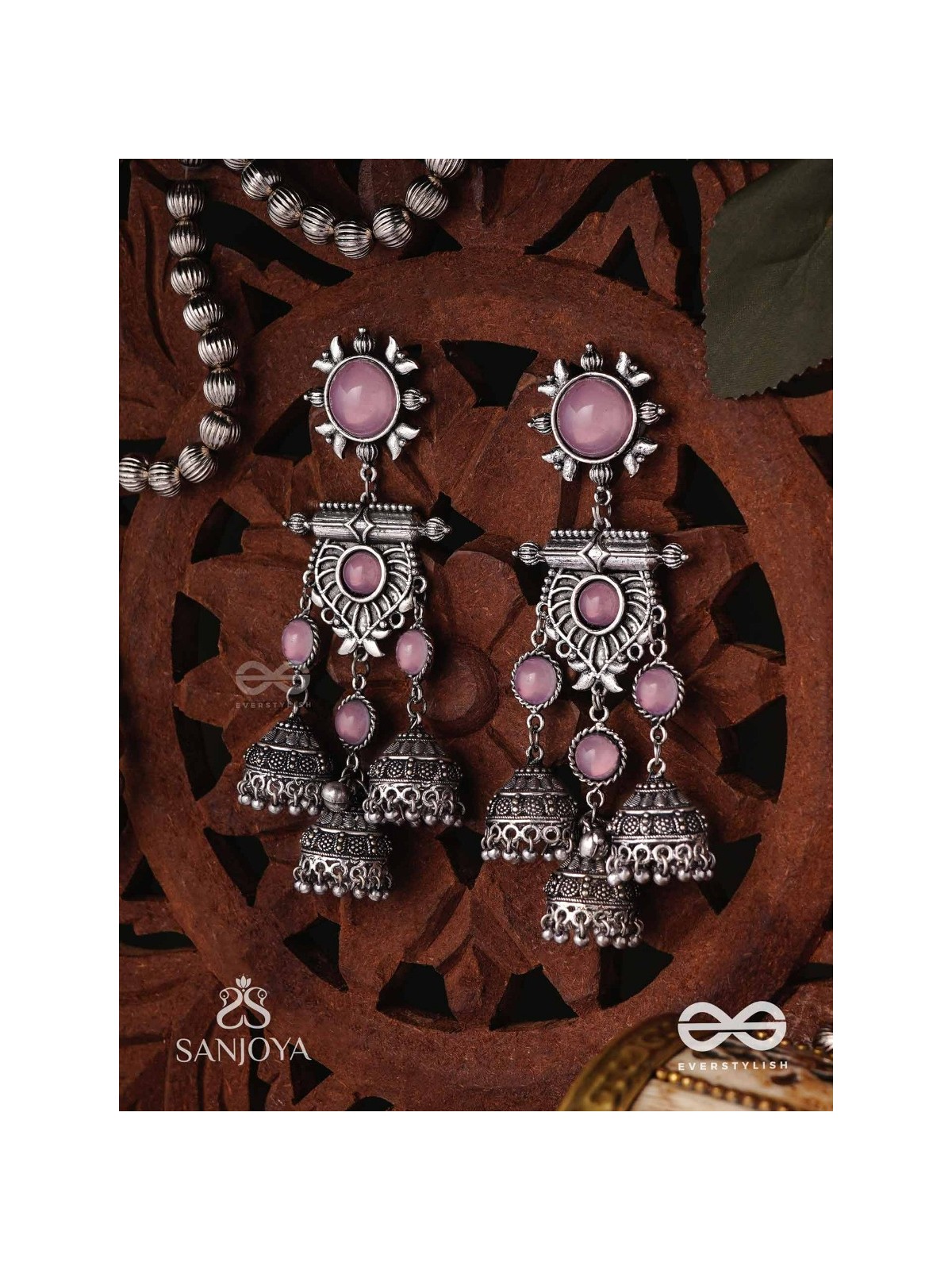 VIJAYAMUKTA-VICTORY PEARLS- REGAL OXIDIZED EARRINGS WITH A CENTRAL PURPLE STONE AND LAYERED JHUMKAS