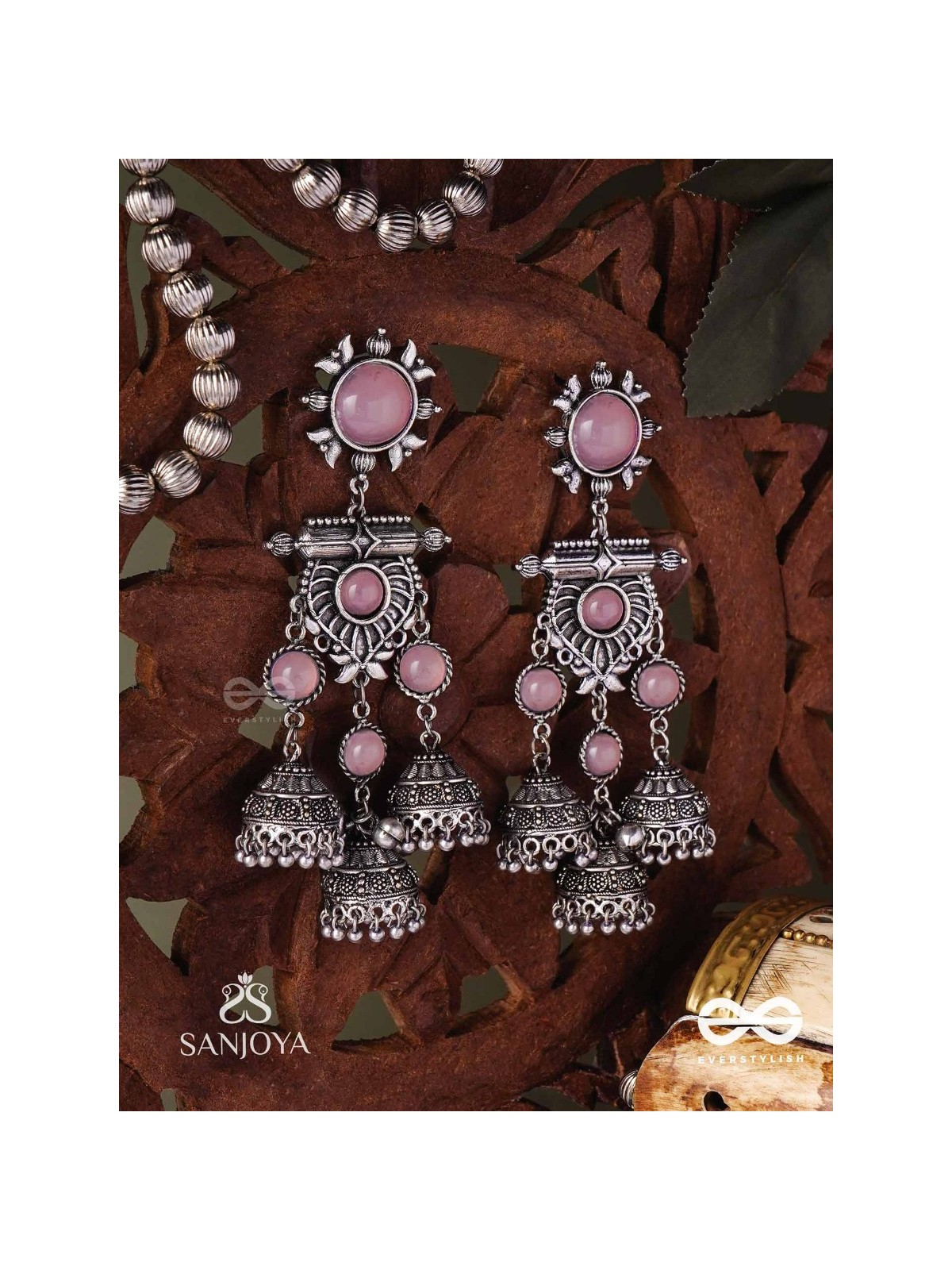VIJAYAMUKTA-VICTORY PEARLS- REGAL OXIDIZED EARRINGS WITH A CENTRAL PURPLE STONE AND LAYERED JHUMKAS