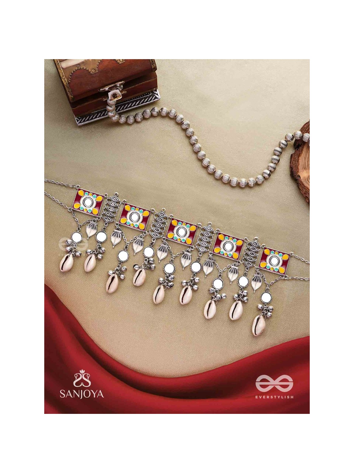 SANGRAHITAVARNA- COLLECTED HUES- ENAMELLED OXIDIZED CHOKER NECKPIECE IN PASTEL HUES WITH COWRIE SHELLS, GHUNGROOS AND MIRRORWORK