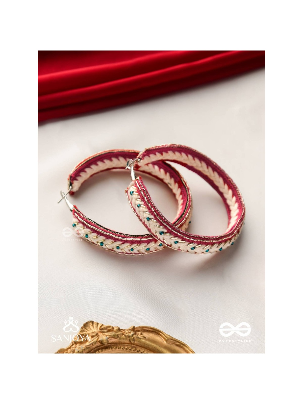 Vasantiruchi- Spring Charm- Embroidered earrings with red and white threads, decorated with beads and gold accents