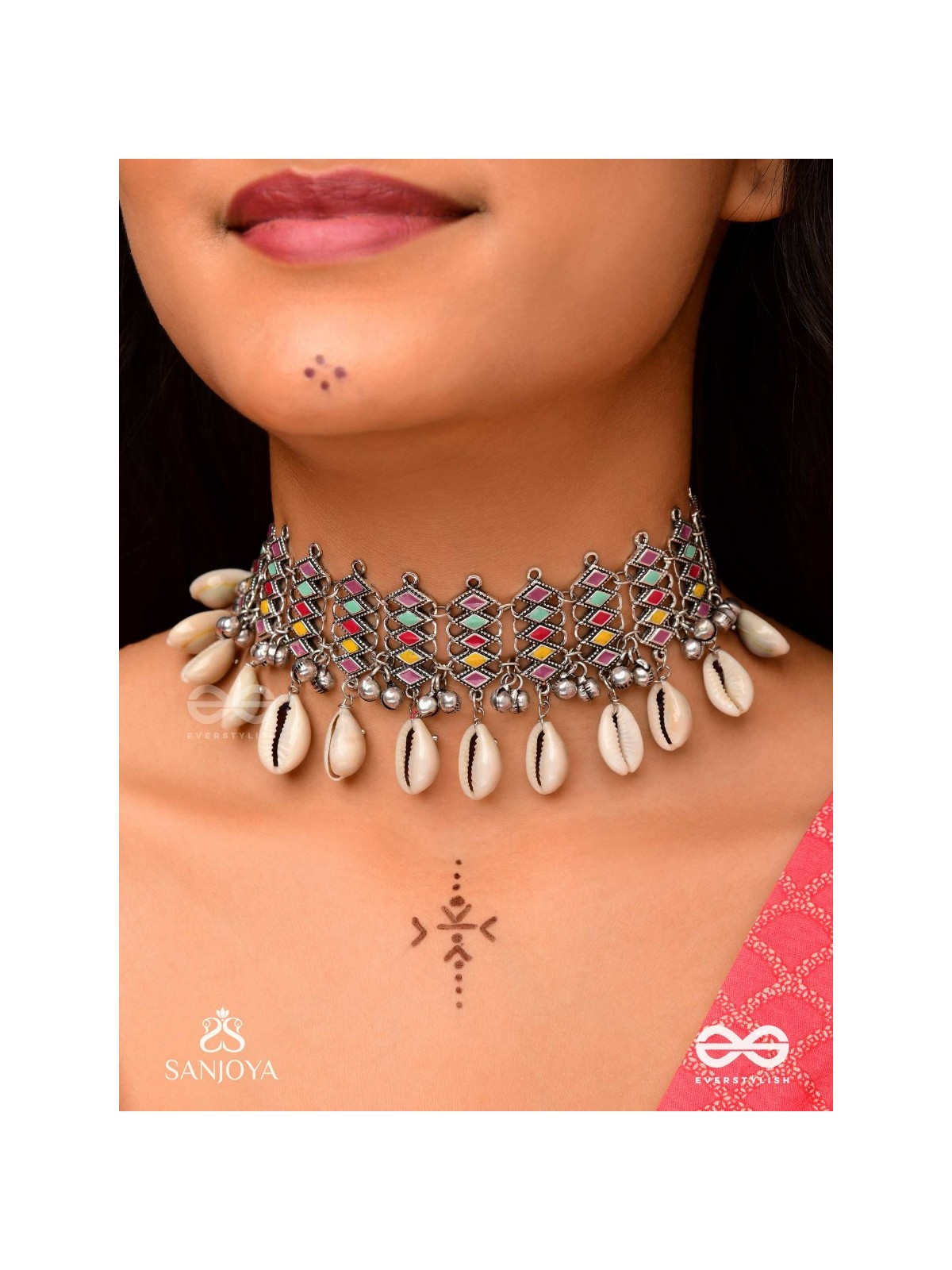 SHANKHAMALA-CONCH GARLAND- OXIDIZED NECKPIECE FEATURING PASTEL-COLOURED METALWORK, EMBELLISHED WITH DANGLING COWRIE SHELLS AND GHUNGROO'S