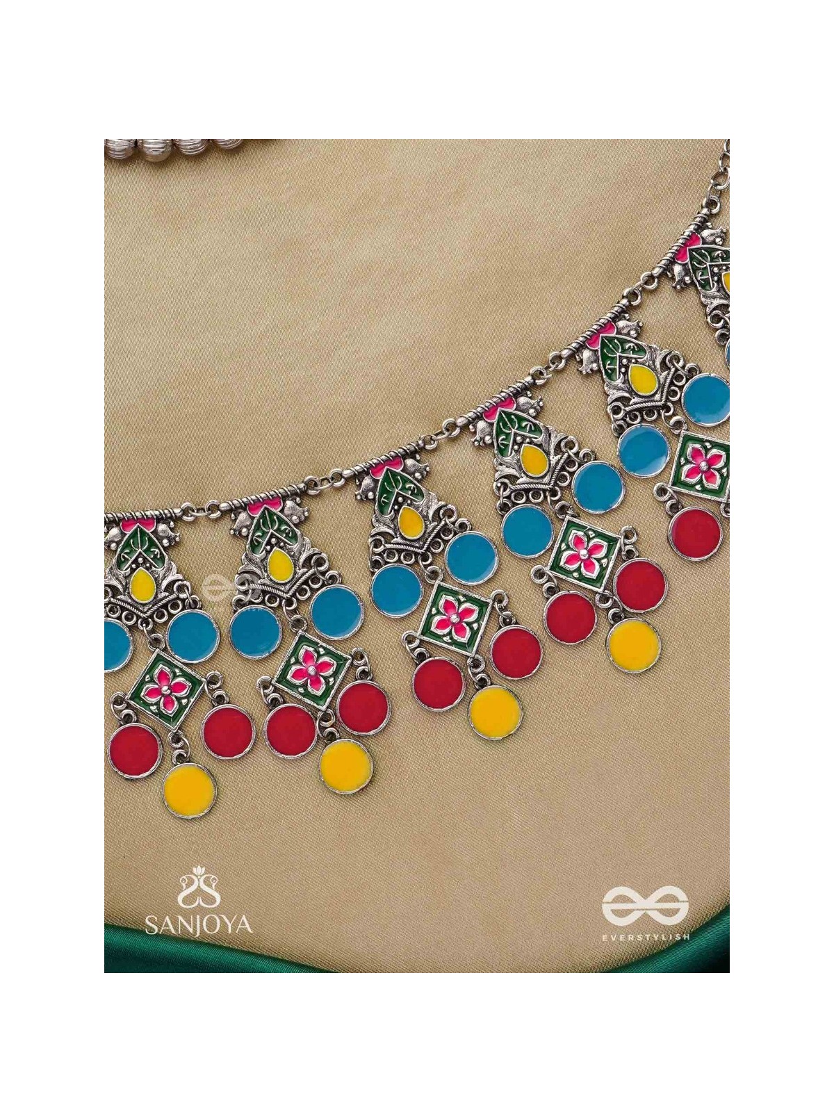 Manjari- Blossom Chain-Slender metallic chain with cascade of enamel designs.