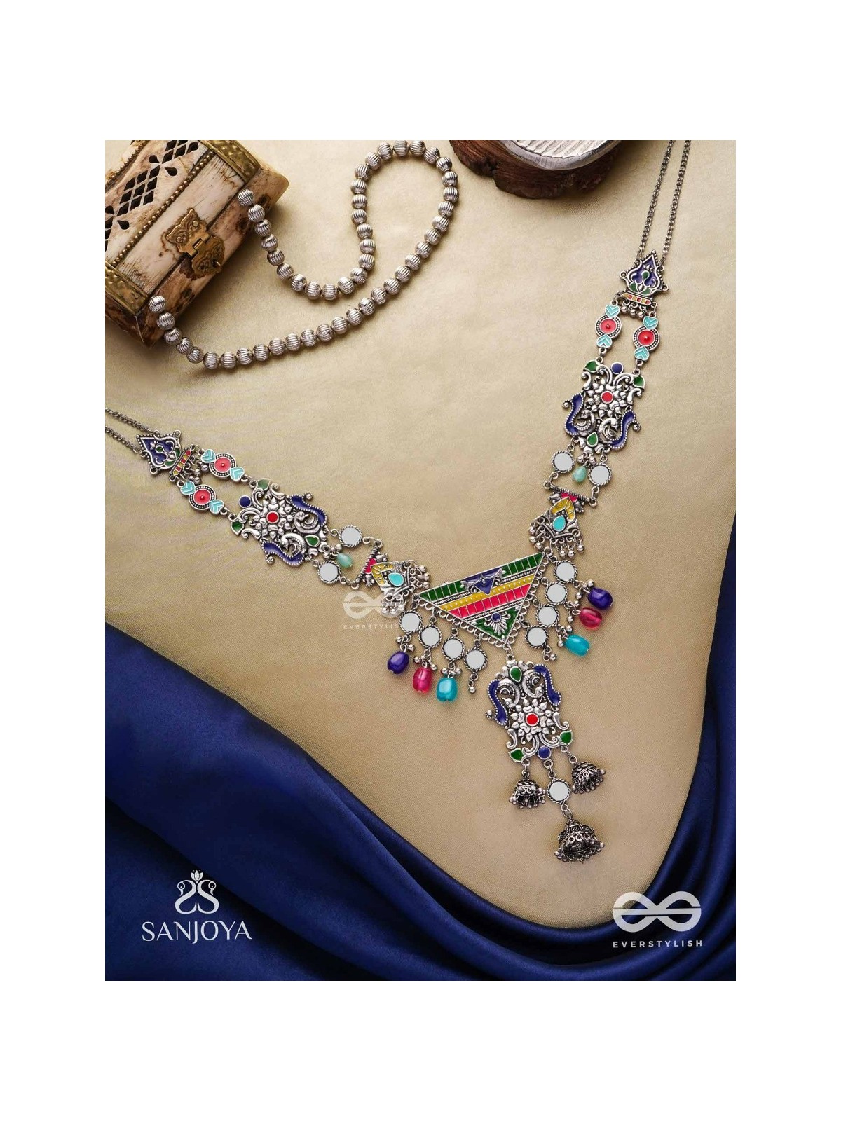 Prema raga- Love colour- Enamelled oxidized neckpiece embellished with beads, mirror and dangling jhumka.