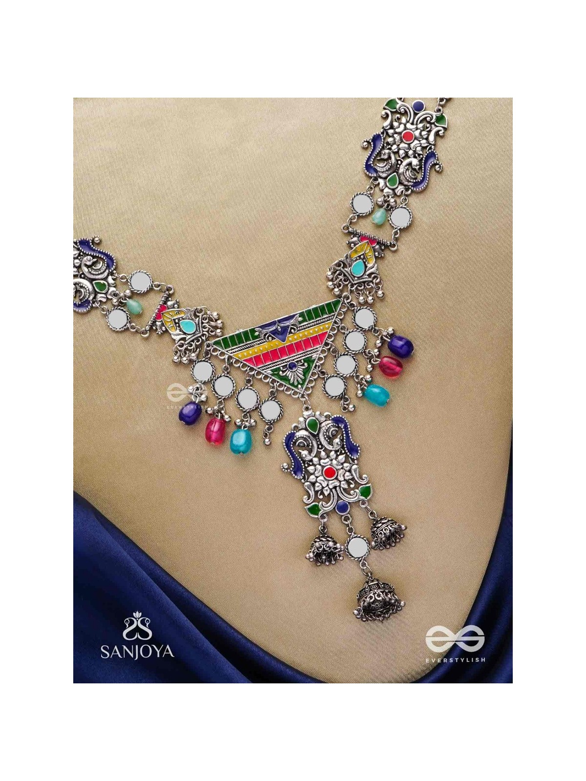 Prema raga- Love colour- Enamelled oxidized neckpiece embellished with beads, mirror and dangling jhumka.