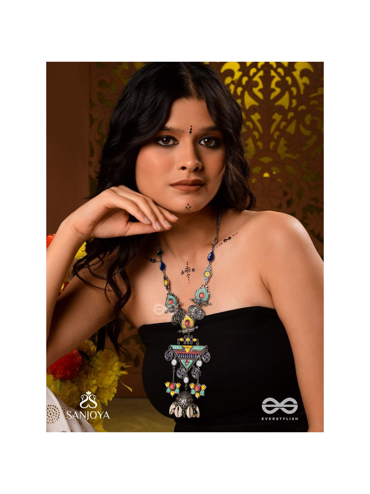 Rangapadma-Color bloom- Enamelled Neckpiece with cowrie shells,mirror and colorful gemstones on oxidized metalwork.