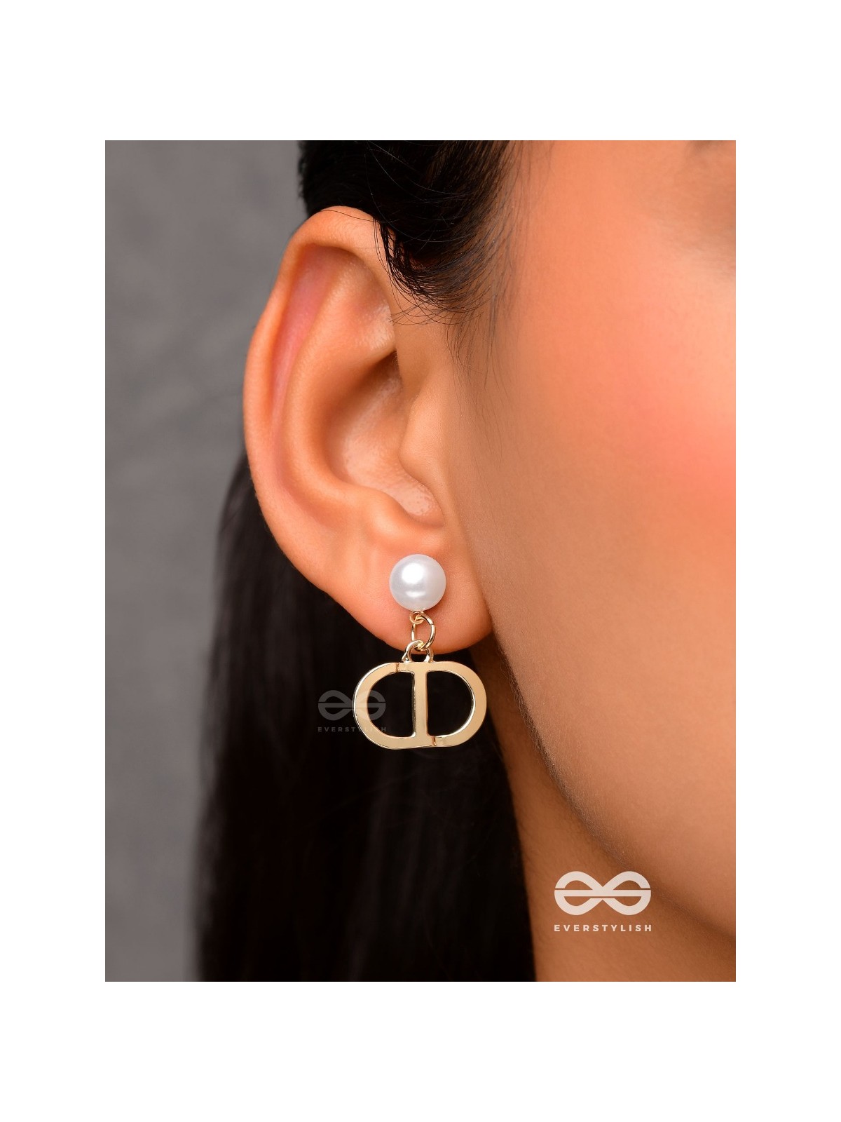 Starlit orb- dangling pearl earrings with golden spheres 