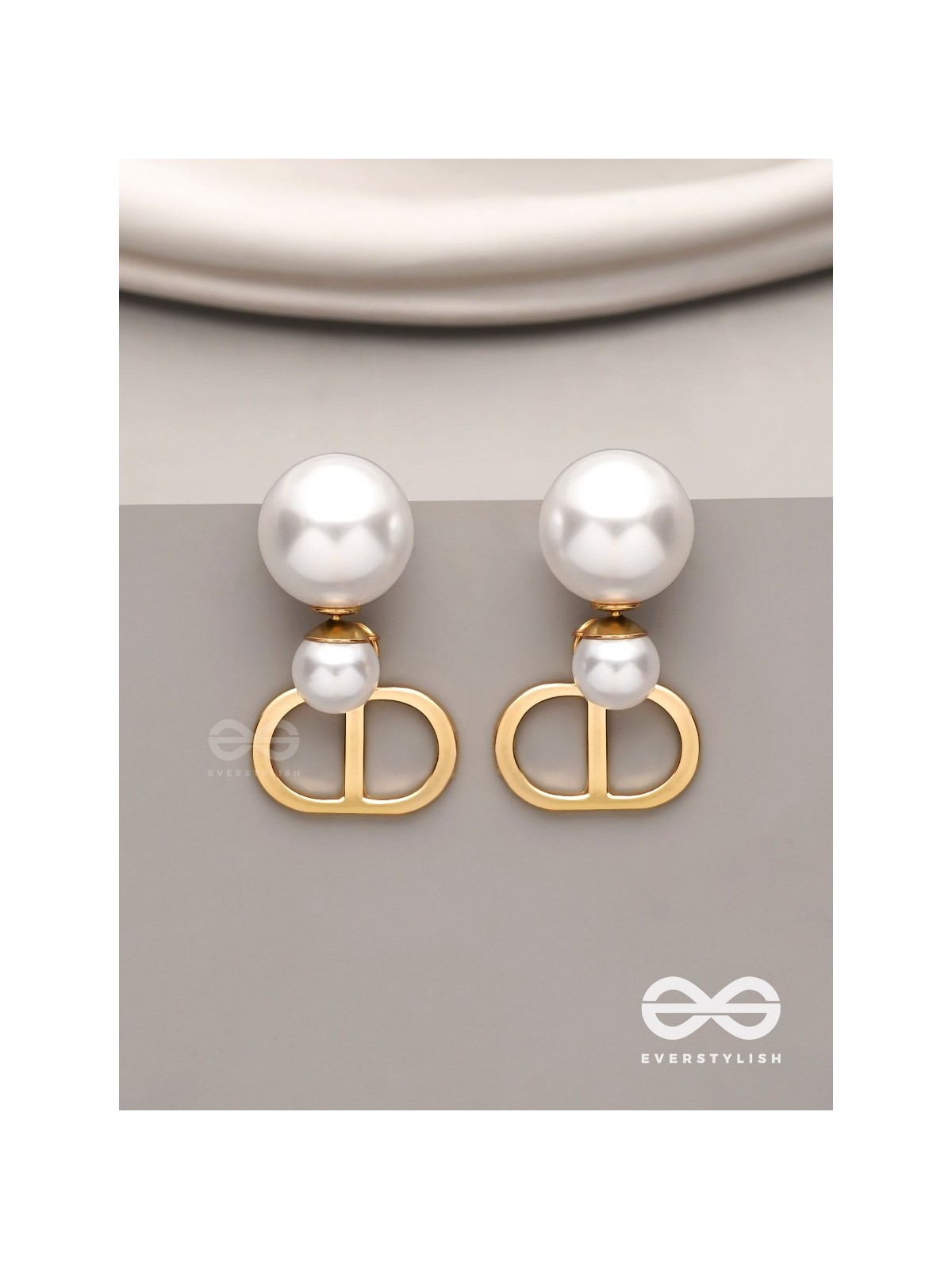 Starlit orb- dangling pearl earrings with golden spheres 