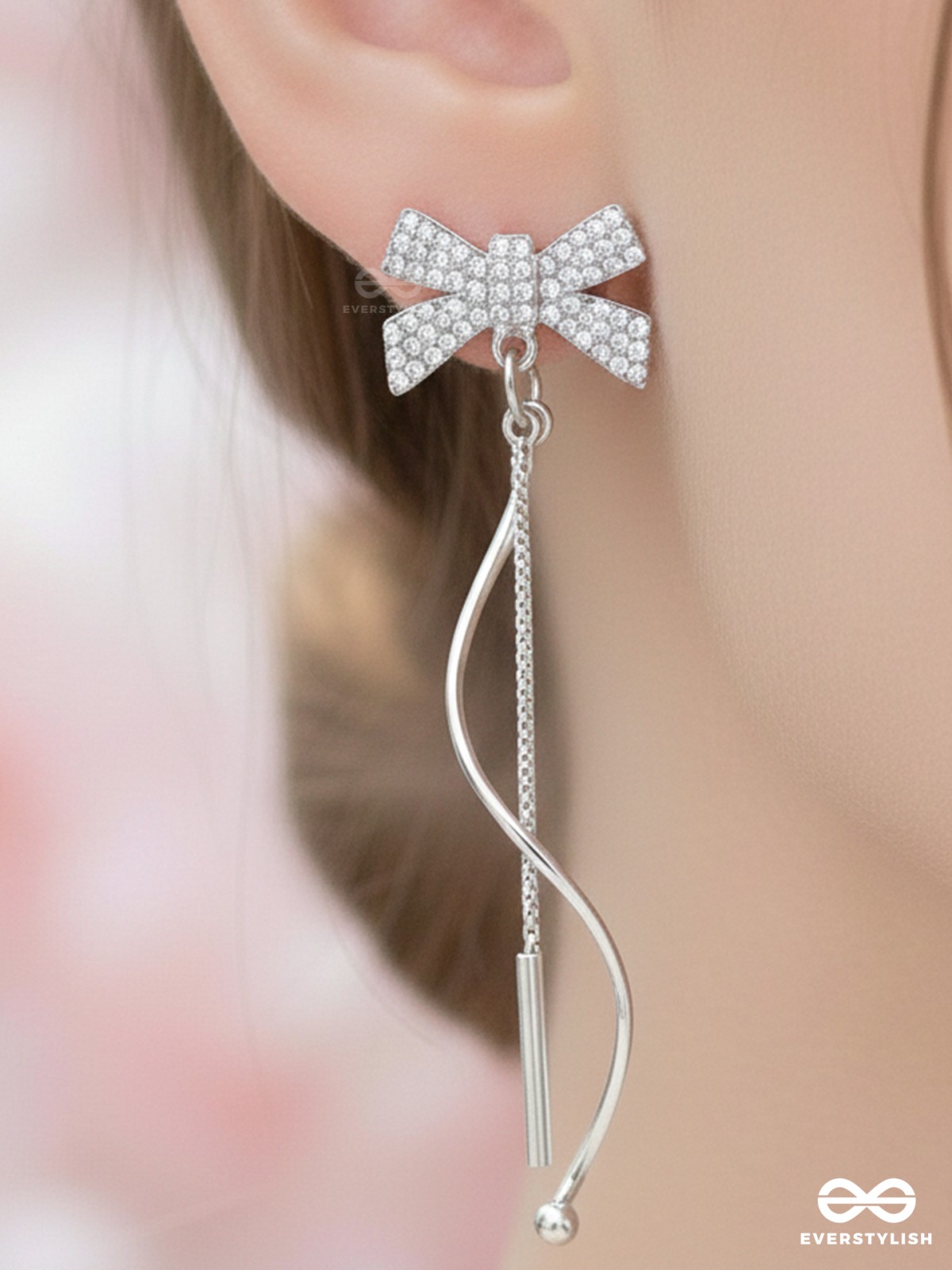 Starry Knots- Dangling Silver Cubic Zirconia Earrings 