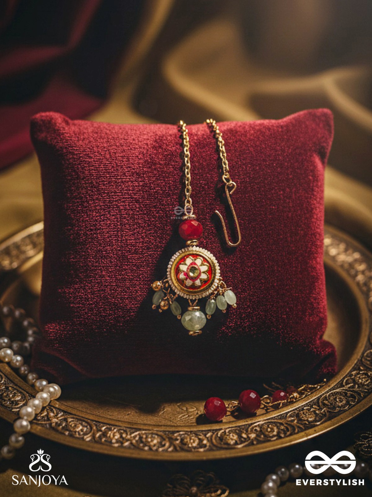 SHONAPRABHA- RADIANCE OF GOLD AND RED- HANDCRAFTED KUNDANMAANGTIKA  WITH GOLDEN MOONS AND RED BEADS