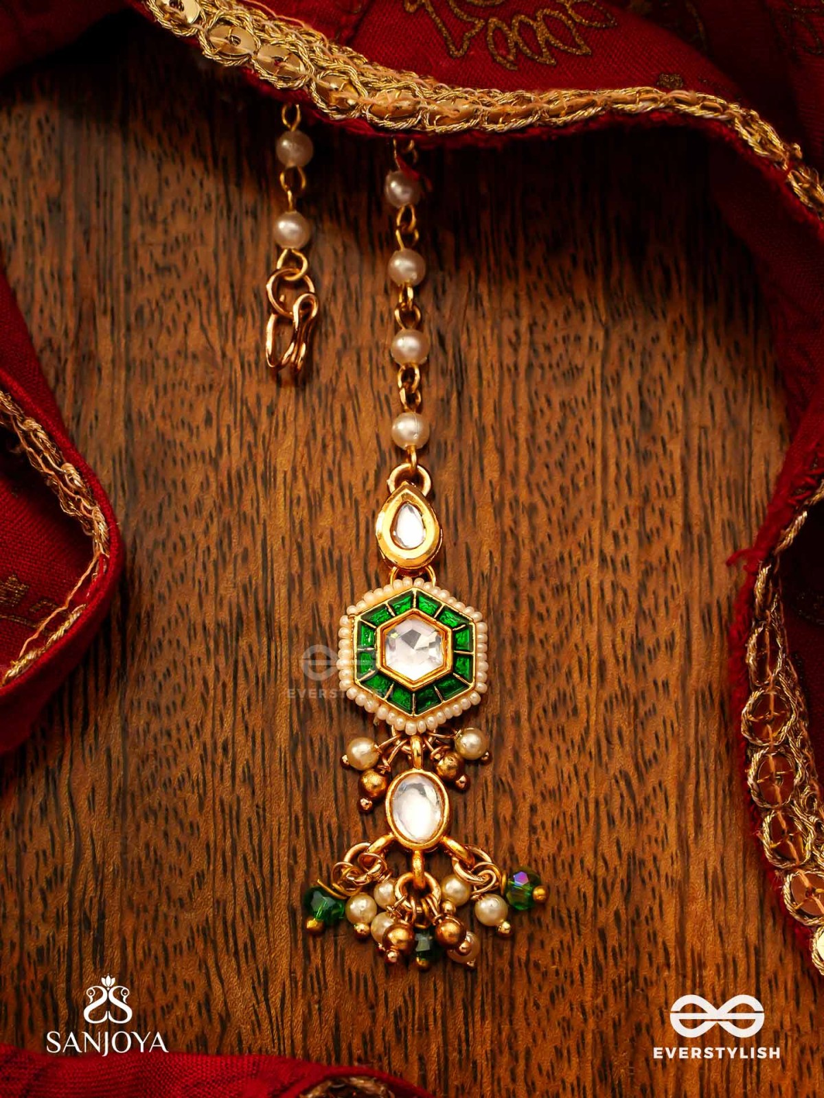 JALNIDHI - OCEAN’S TREASURE - HANDCRAFTED KUNDAN MAANGTIKA WITH GREEN GEMSTONES AND GOLDEN DETAILS