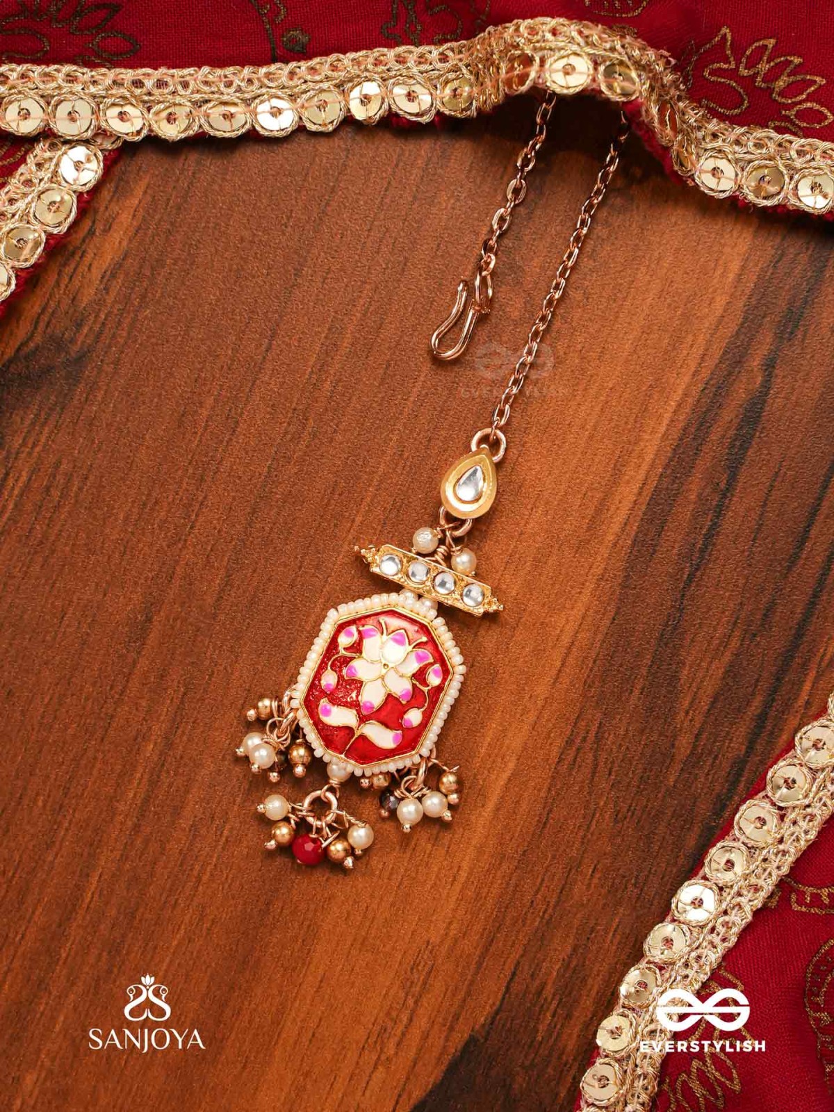 ABHARANI - THE ADORNED QUEEN- FINE TRADITIONAL KUNDAN MAANGTIKA WITH RED ENAMEL WORK, PEARL AND BEADS