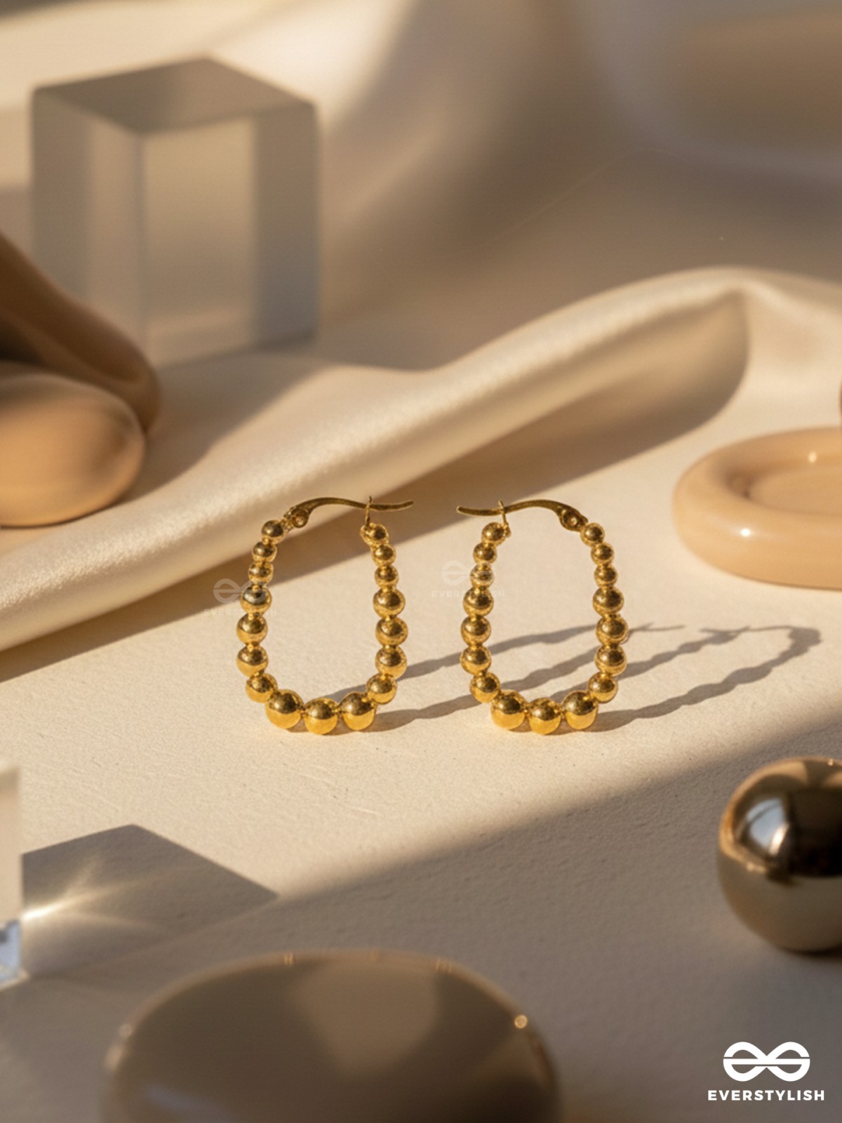 SUNBURST HOOPS – DELICATE DROP-SHAPED STAINLESS STEEL EARRINGS