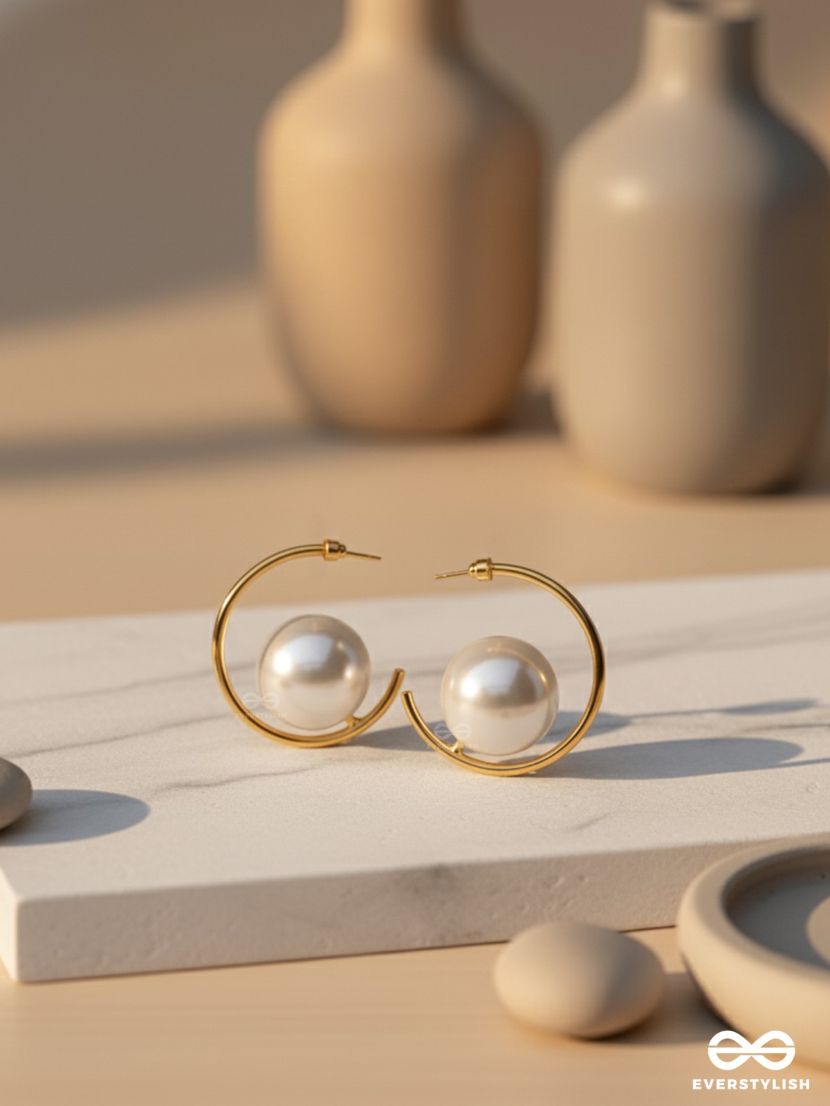 LUNAR LOOP – MODERN PEARL EARRINGS IN A GOLD HOOP DESIGN