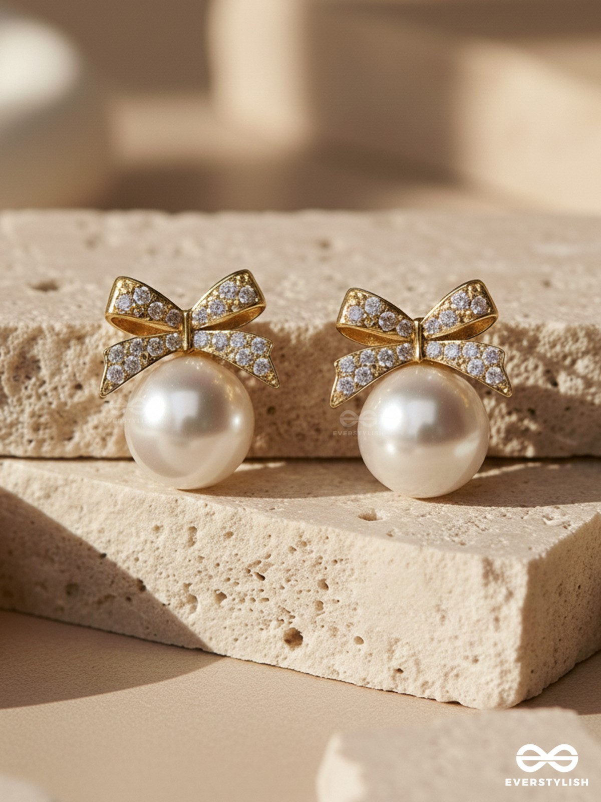 BOW IN SNOW- WHITE PEARL BOW EARRINGS