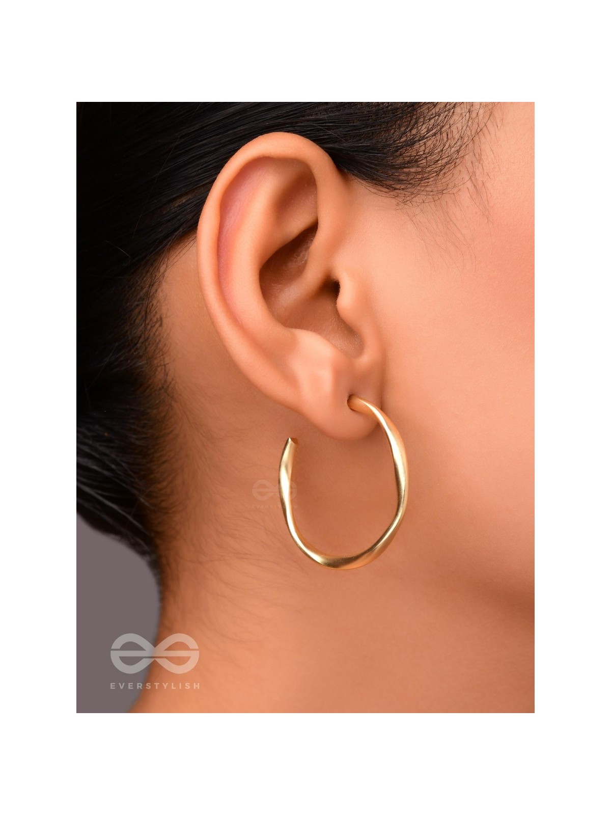 The Subtle Affirmation Golden Twists Hoop Earrings
