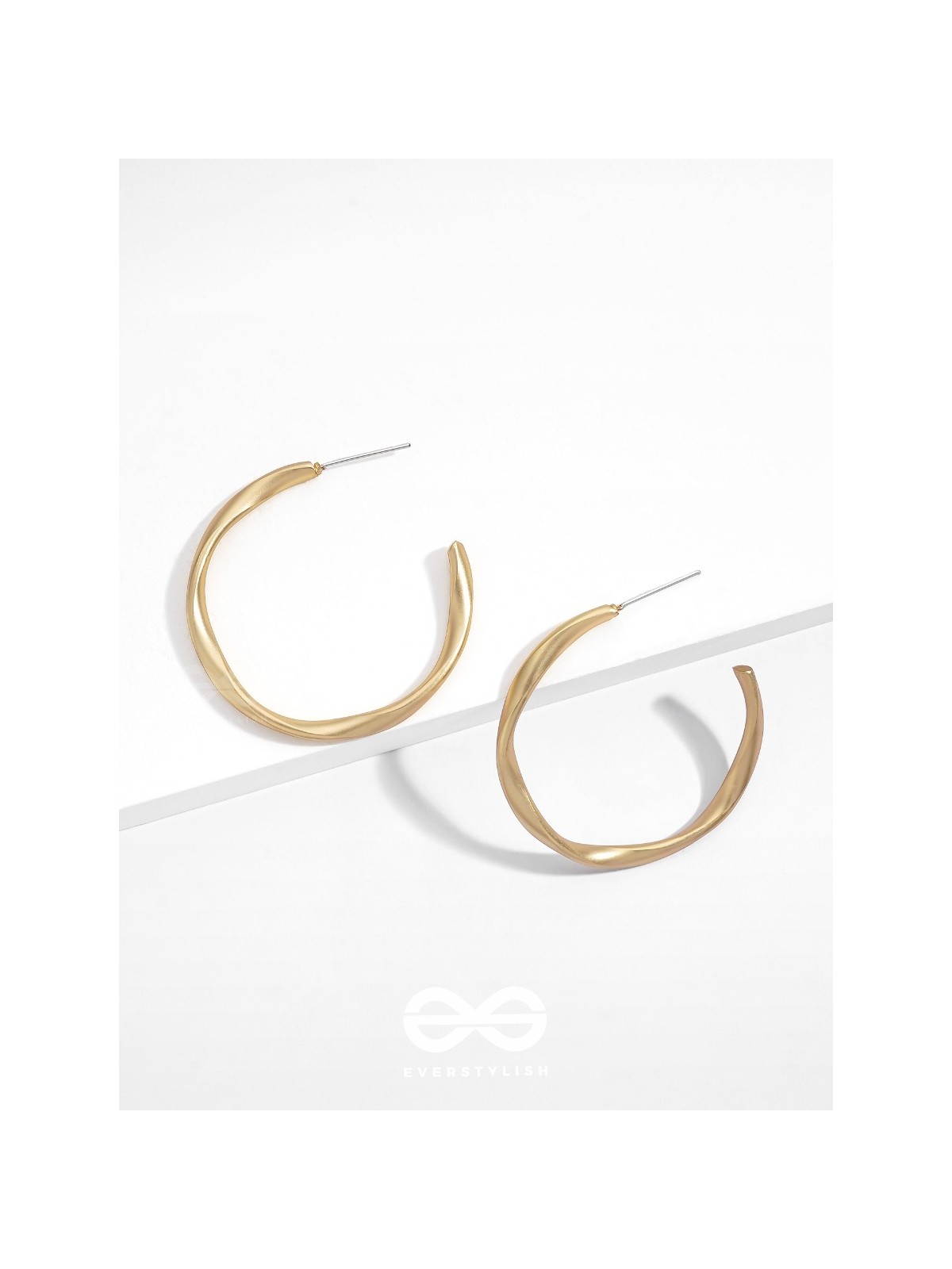 The Subtle Affirmation Golden Twists Hoop Earrings