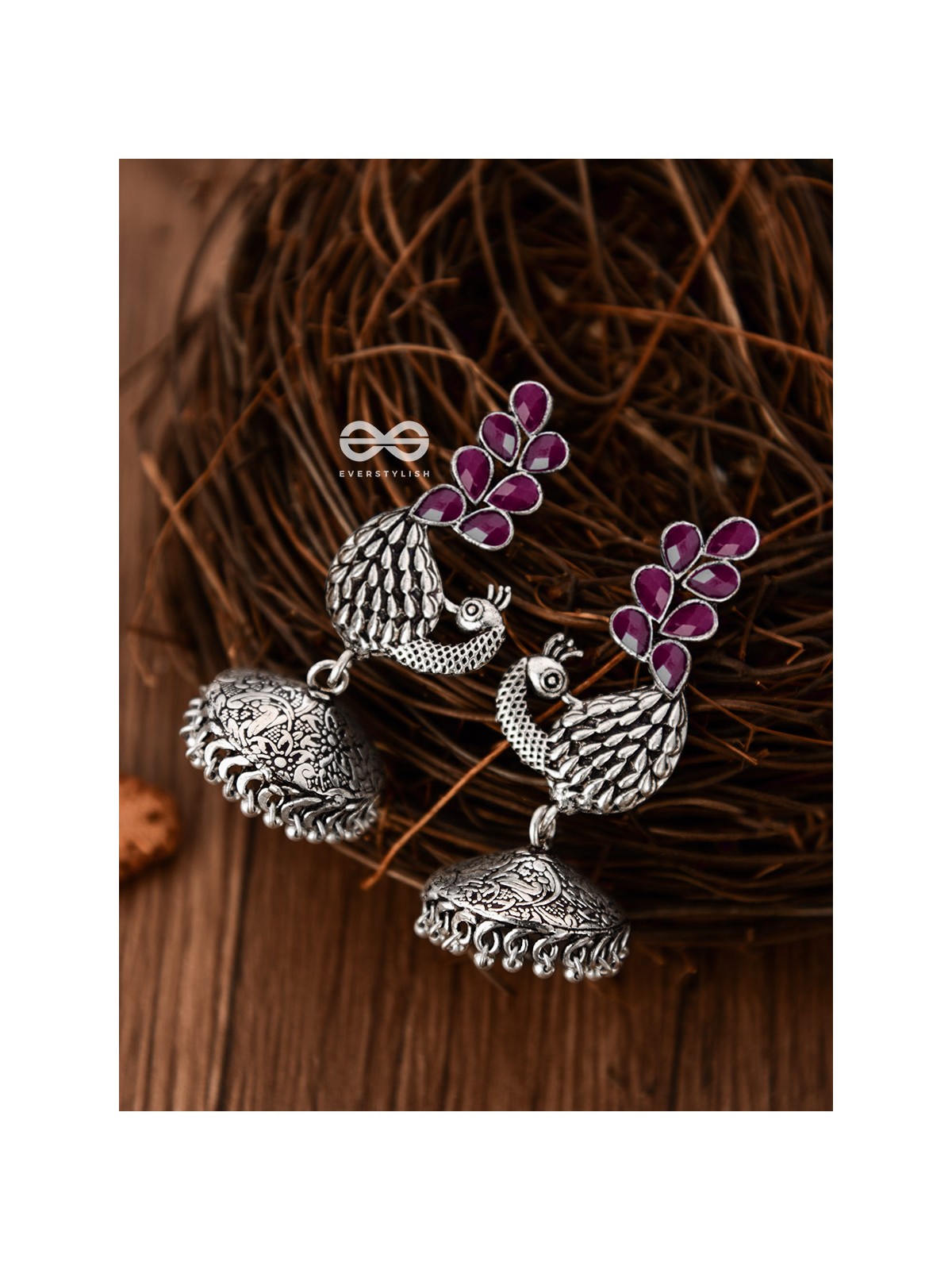 The Dancing Peacocks Engraved Jhumkis (Ruby Red) - Embellished Oxidised Collection