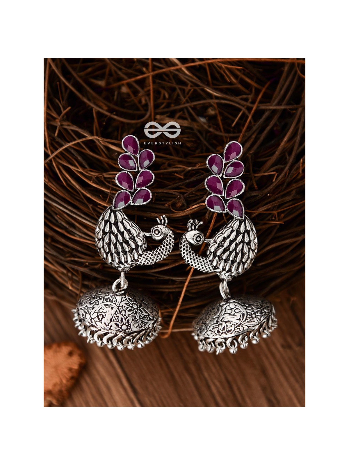 The Dancing Peacocks Engraved Jhumkis (Ruby Red) - Embellished Oxidised Collection