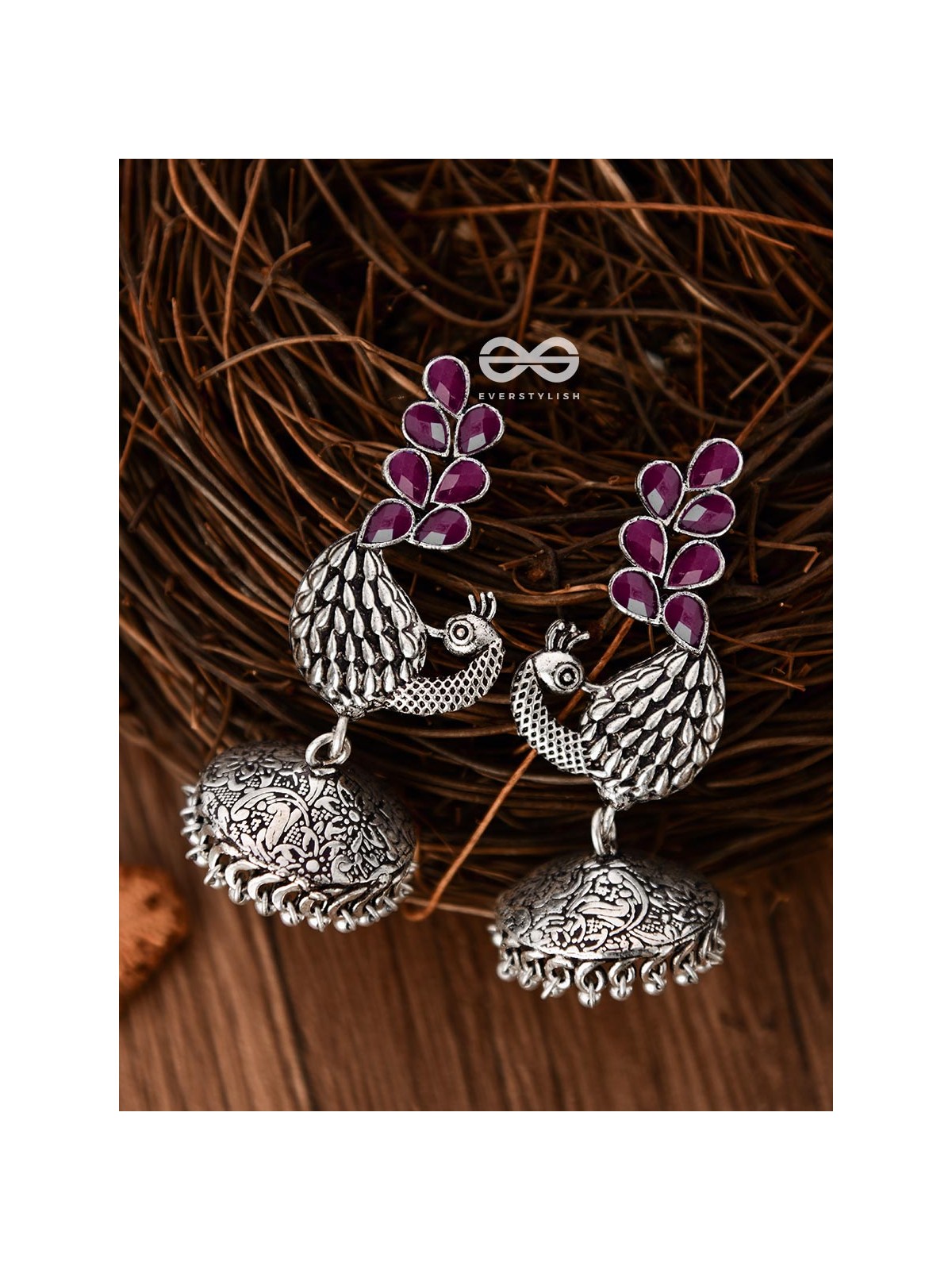 The Dancing Peacocks Engraved Jhumkis (Ruby Red) - Embellished Oxidised Collection