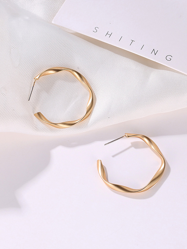 The Subtle Affirmation Golden Twists Hoop Earrings